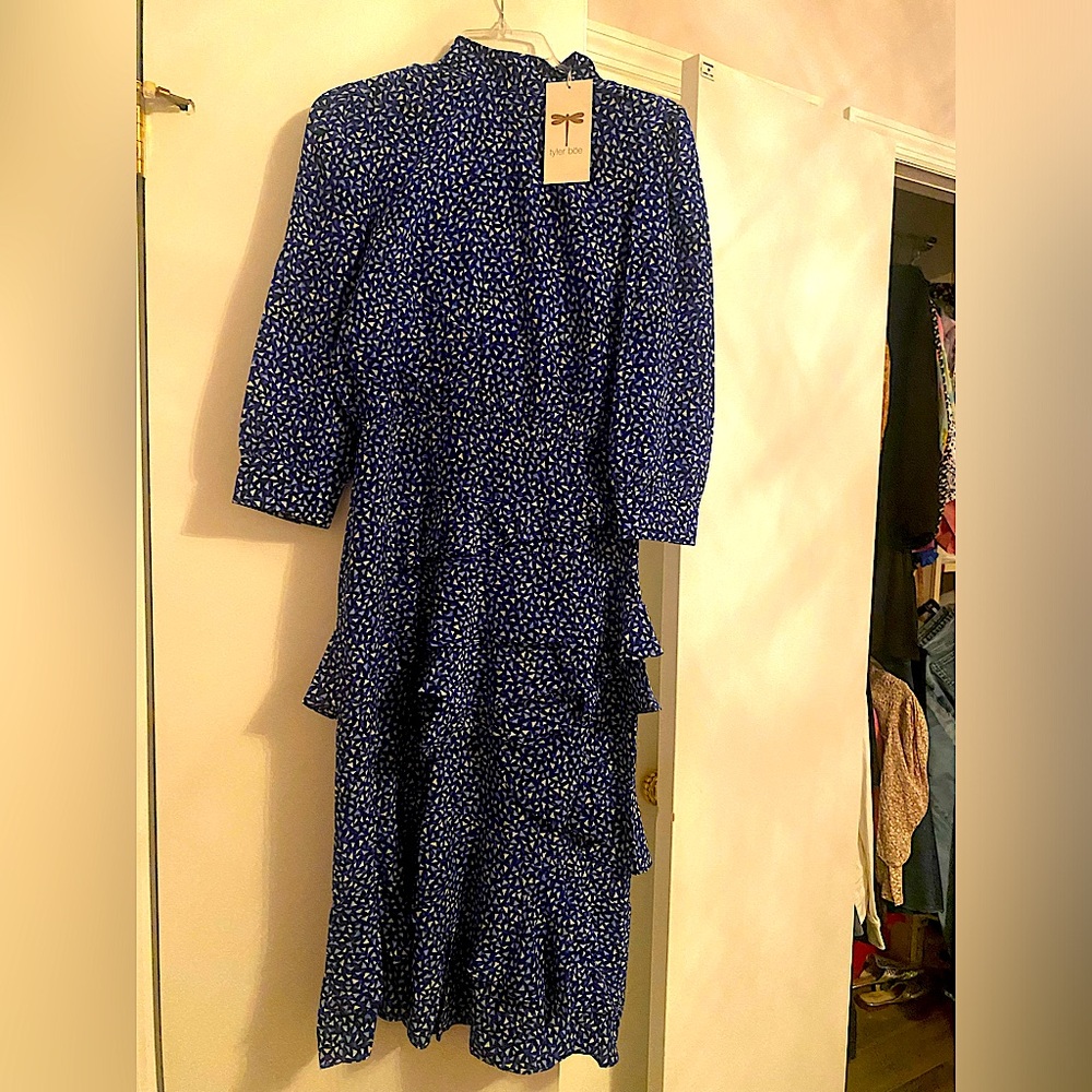 Multi color dress size 6 never worn tags still on the dress